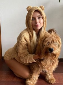 Polina Malinovskaya with her dog