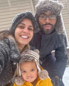 Janine Tate with her husband and kid